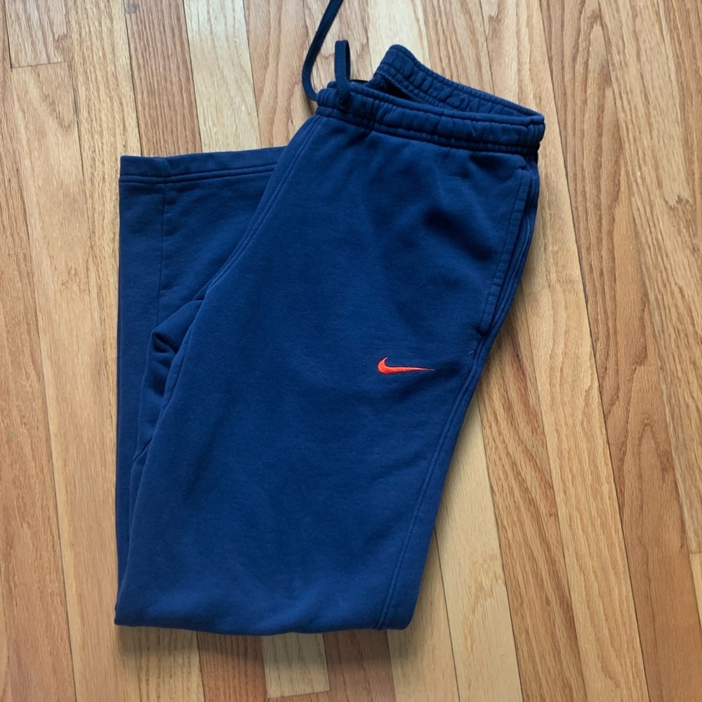 Navy blue and orange nike sweats